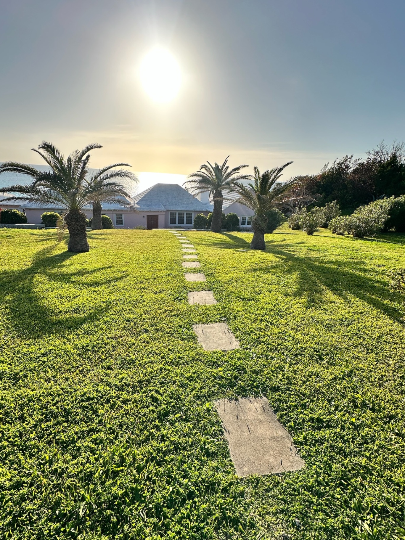 Sky Lark exterior with beautiful lawn and landscaping