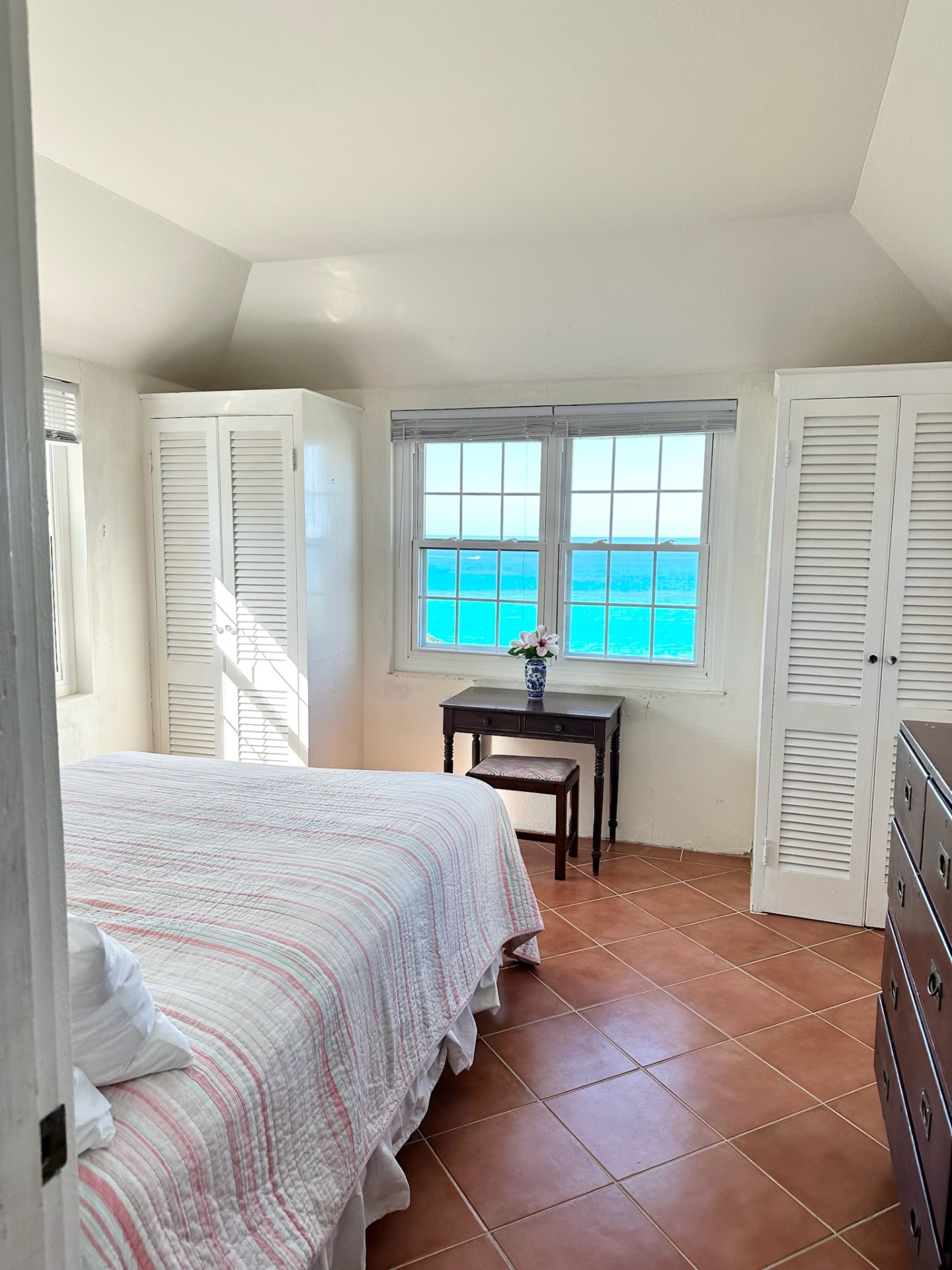 Master bedroom with stunning ocean views through large windows